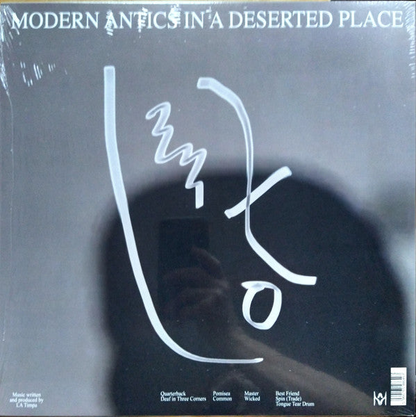 LA Timpa : Modern Antics In A Deserted Place (LP, Album, Sil)
